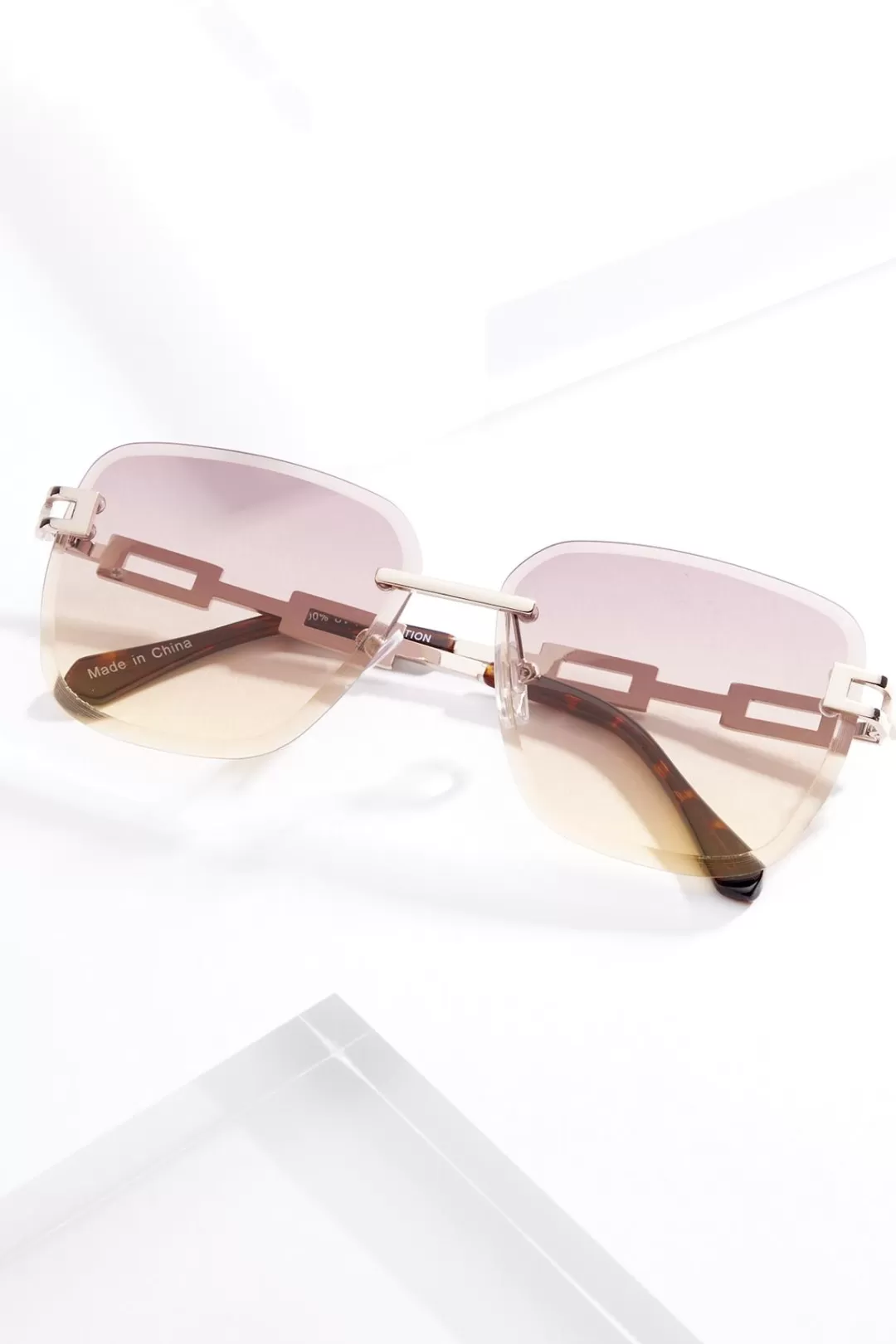 Cato Sunglasses | Rimless Tort Chain Arm Sunglasses